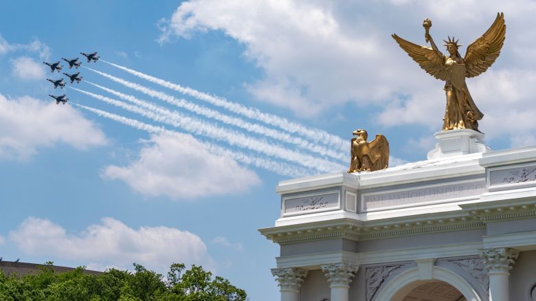 The Air Force Thunderbirds fly past a mockup of President Donald Trump's proposed Triumphal Arch at the Great American State Fair on the National Mall as part of "Wings of Freedom" day, in Washington, DC, on July 3.