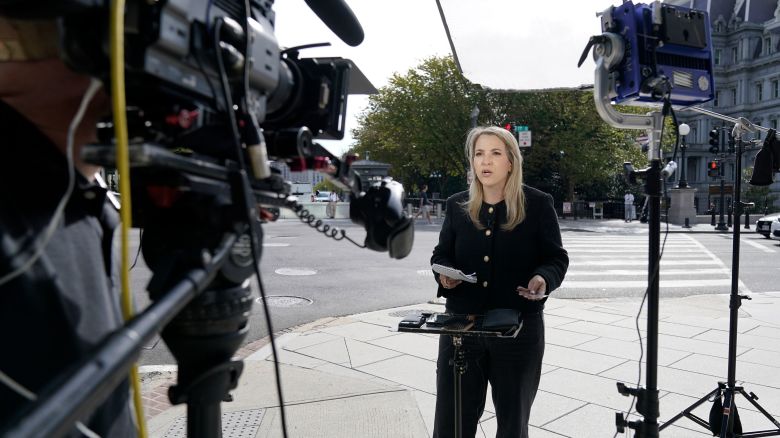 CNN Senior White House Reporter Betsy Klein, holding an empty credential holder, reports near the White House complex after having her credential confiscated following President Donald Trump's ban on CNN, MS NOW and Politico, Saturday, Sept. 19, 2026, in Washington, DC.